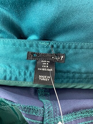 36 Beden Diğer Kumaş Pantolon %70 İndirimli.