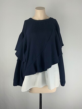 Zara Bluz %70 İndirimli.