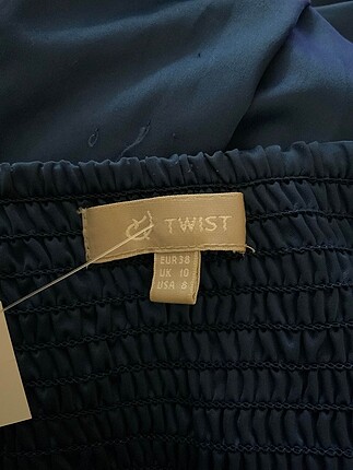 38 Beden Twist Uzun Tulum %70 İndirimli.