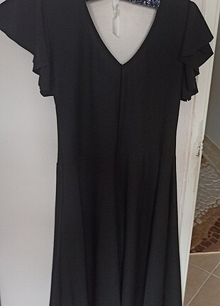 Siyah kiloş elbise