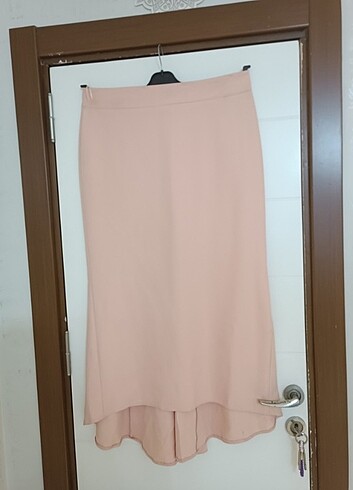Pembe uzun etek