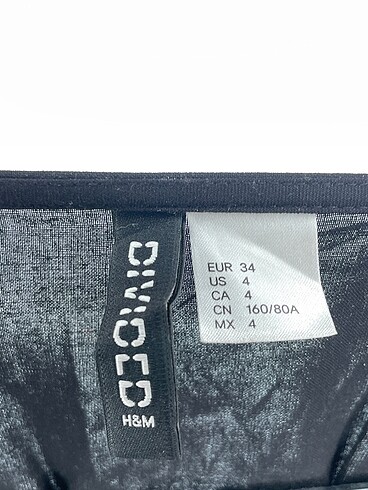 34 Beden siyah Renk H&M Kısa Elbise %70 İndirimli.