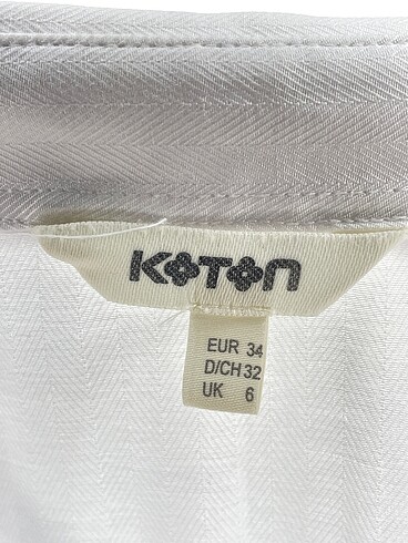 34 Beden beyaz Renk Koton Gömlek %70 İndirimli.