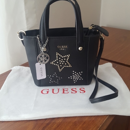 Guess canta