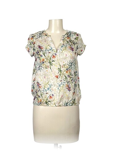 Zara Bluz %70 İndirimli.