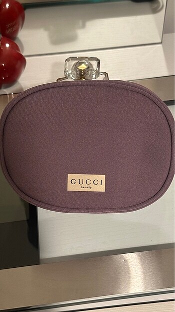 Orijinal Gucci mor makyaj çantası