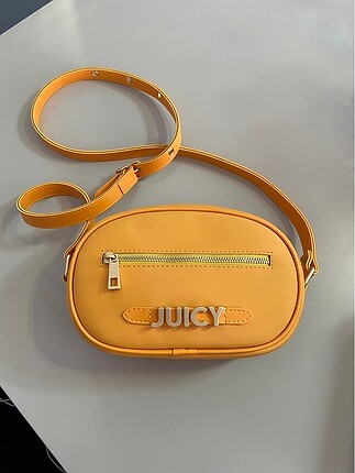 Juicy couture marka çapraz askılı çanta.