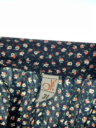 34 Beden çeşitli Renk Koton Midi Etek %70 İndirimli.