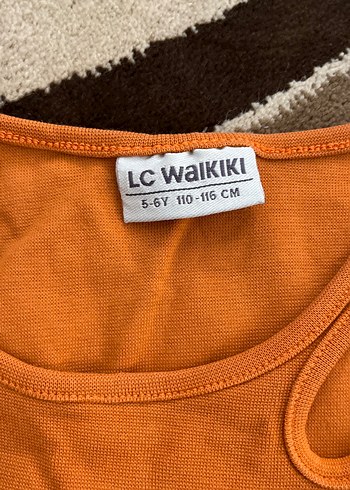 Parlak Turuncu Çocuk Atlet - Görsel 3