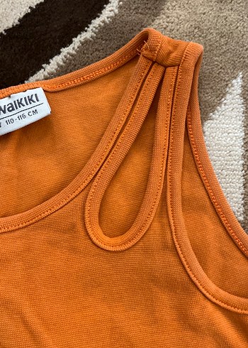 Parlak Turuncu Çocuk Atlet - Görsel 2