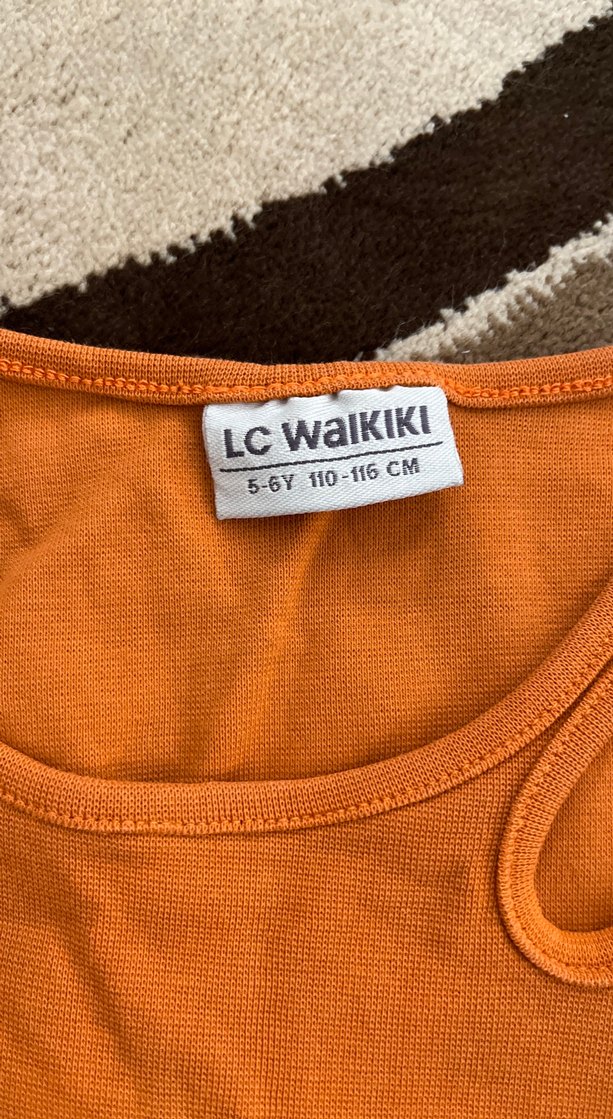 Parlak Turuncu Çocuk Atlet - Görsel 3