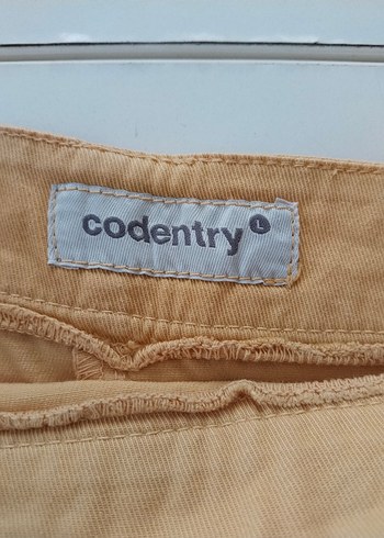l Beden sarı Renk Codentry marka L beden Düğmeli Mini Etek