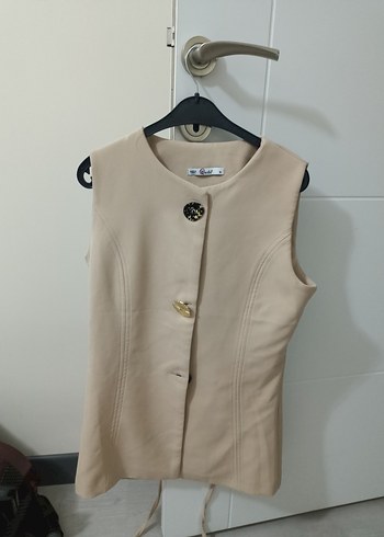 Diğer Bej Kolsuz Siklik Minimalist Yelek