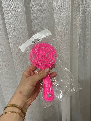 Masaj tarağı aynı zamanda
