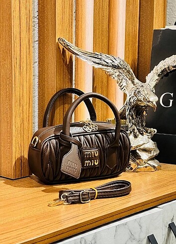 Miu miu acı kahve askılı çanta 