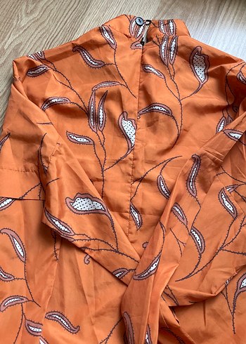 Turuncu Kadın
Haşema - Görsel 4