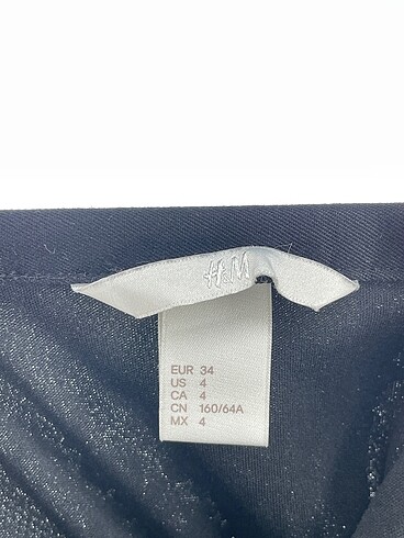 34 Beden siyah Renk H&M Midi Etek %70 İndirimli.