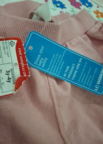 LC Waikiki Pembe Desenli Uzun Kollu Örgü Bebek Kız Takımı