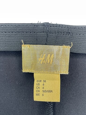 36 Beden siyah Renk H&M Midi Etek %70 İndirimli.