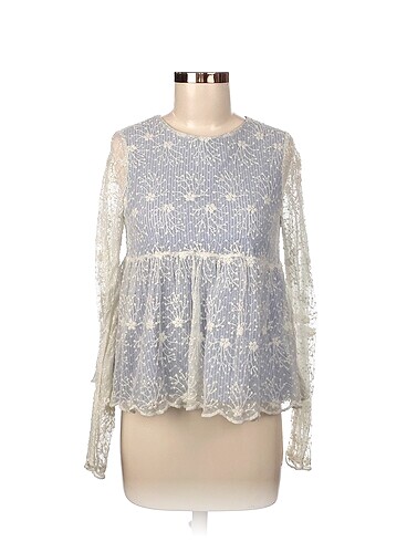 Zara Bluz %70 İndirimli.