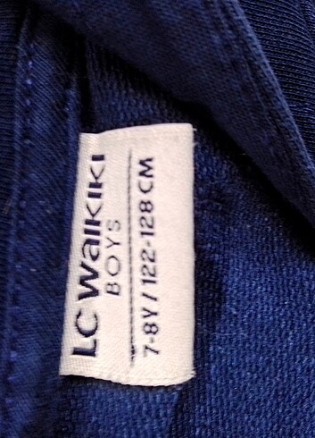 LC Waikiki marka 7 8 yaş kapşonlu fermuarlı cepli ceket cepinde 