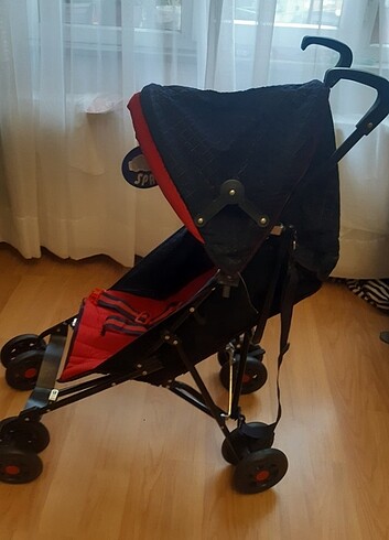 Bebek arabası hic kullanilmamis uzerinde etiketi olan hafif ve r