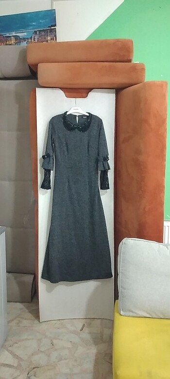 Tozlu kadın elbise