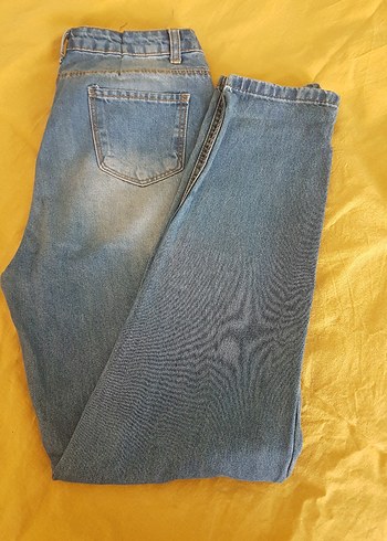 Dizlerde Yırtık Detaylı Mavi Bol Kesim Kadın Kot Pantolon - Görsel 7