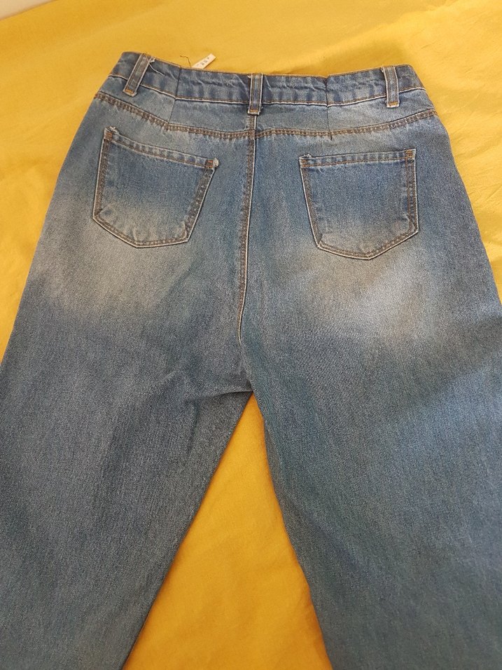 Dizlerde Yırtık Detaylı Mavi Bol Kesim Kadın Kot Pantolon - Görsel 4