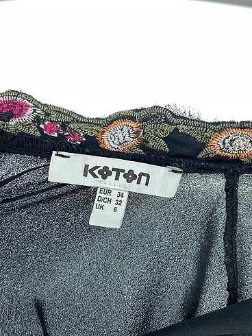 34 Beden çeşitli Renk Koton Bluz %70 İndirimli.