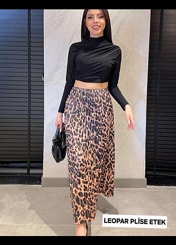 Leopar desenli beli lastikli pisileli etek fotoğrafları kaydırın