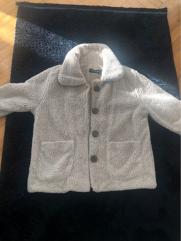 Peluş krem mont sorunsuz