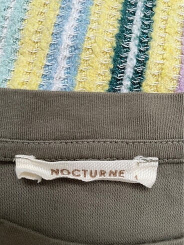 Nocturne Hande erçelin yüzü olduğu marka hiç giyilmedi