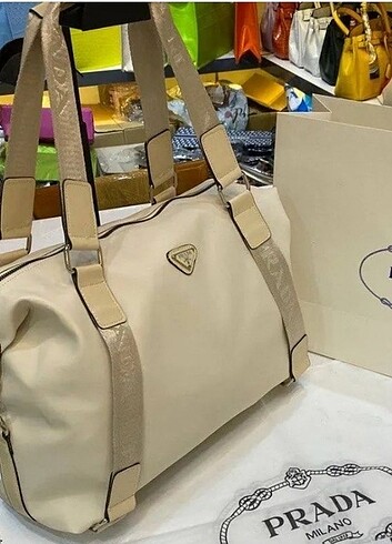 Krem #Prada #Kolçantası