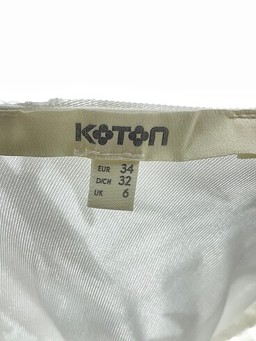 34 Beden beyaz Renk Koton Kısa Elbise %70 İndirimli.