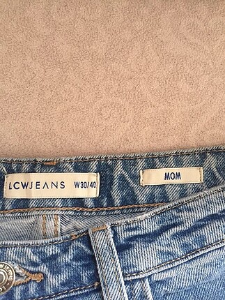 30 Beden mavi Renk mom jean