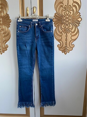 Püsküllü kot pantolon 