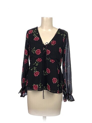H&M Bluz %70 İndirimli.