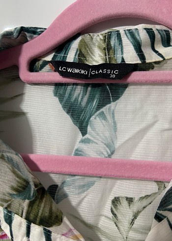 Uzun, bol kesim, yaprak desenli kadın elbise - Görsel 2