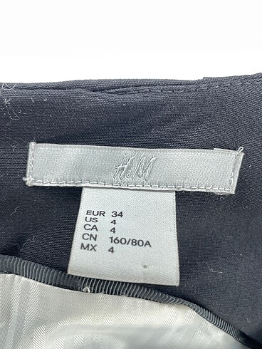34 Beden siyah Renk H&M Uzun Elbise %70 İndirimli.