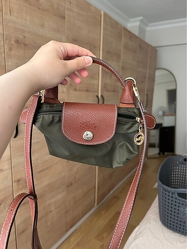 A kalitede birebir aynısı longchamp çanta