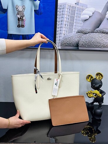Lacoste Çift taraflı kol çantası