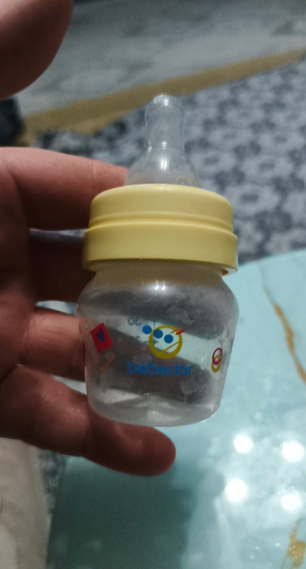 Sarı Bebek Biberonu Pastel Tonlarda - Görsel 2