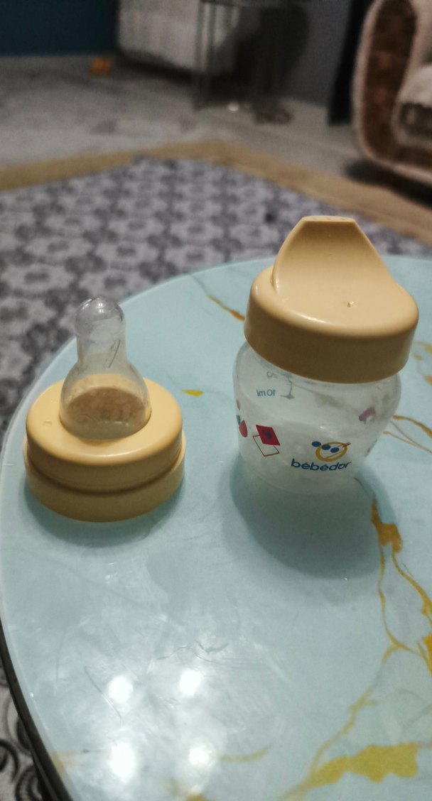 Sarı Bebek Biberonu Pastel Tonlarda - Görsel 4