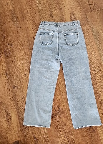 LC Waikiki Mavi renkli bol paça kız çocuk pantolon