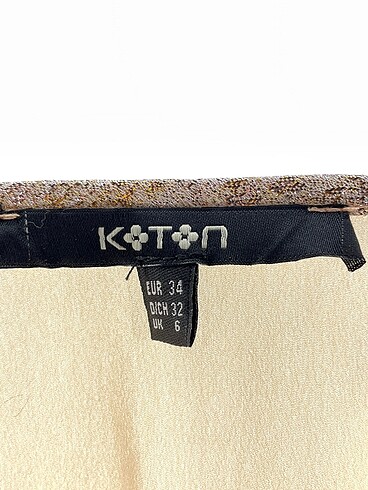 34 Beden ten rengi Renk Koton Bluz %70 İndirimli.