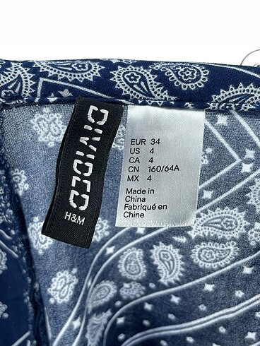 34 Beden çeşitli Renk H&M Kısa Tulum %70 İndirimli.