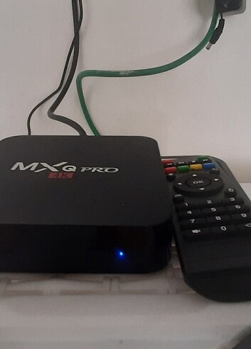 Mx q pro Android tv box sürüm 6 hafıza 8 rem 1 