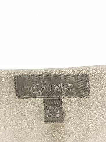 38 Beden beyaz Renk Twist Bluz %70 İndirimli.