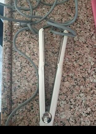 Homend sac duzlestirici